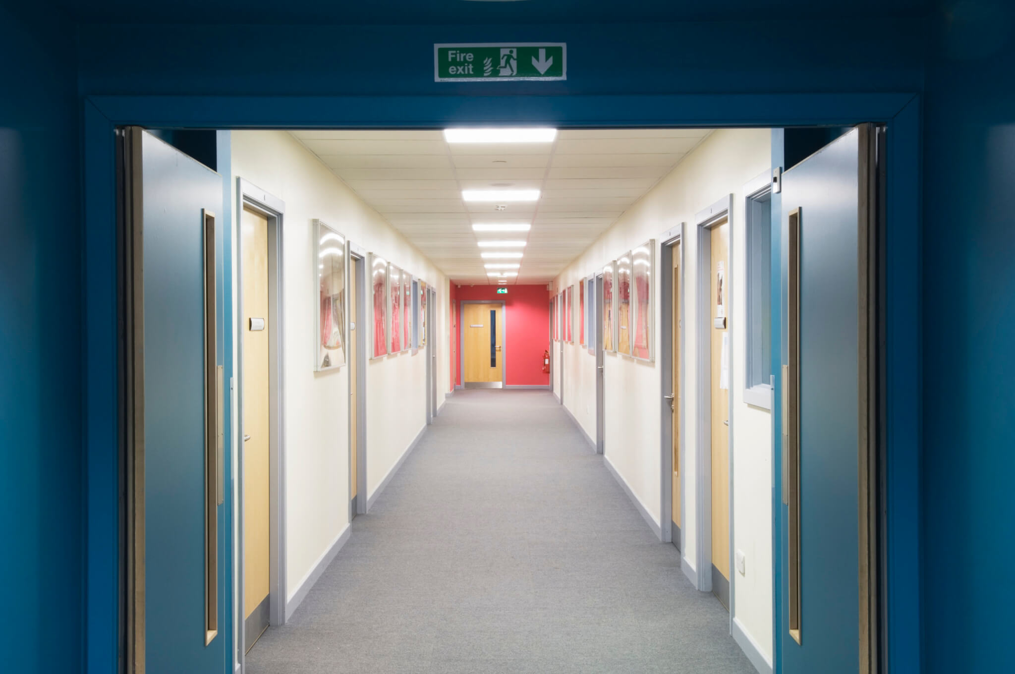 Looking along a corridor in a modern secondary school.